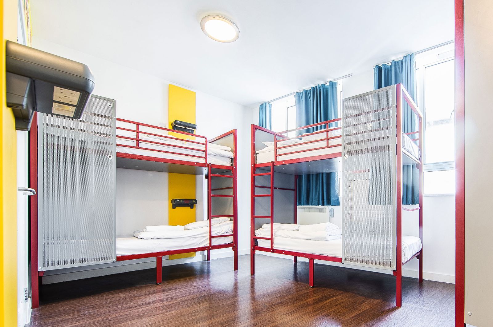 Three Crables in a dormitory with bunkbeds
