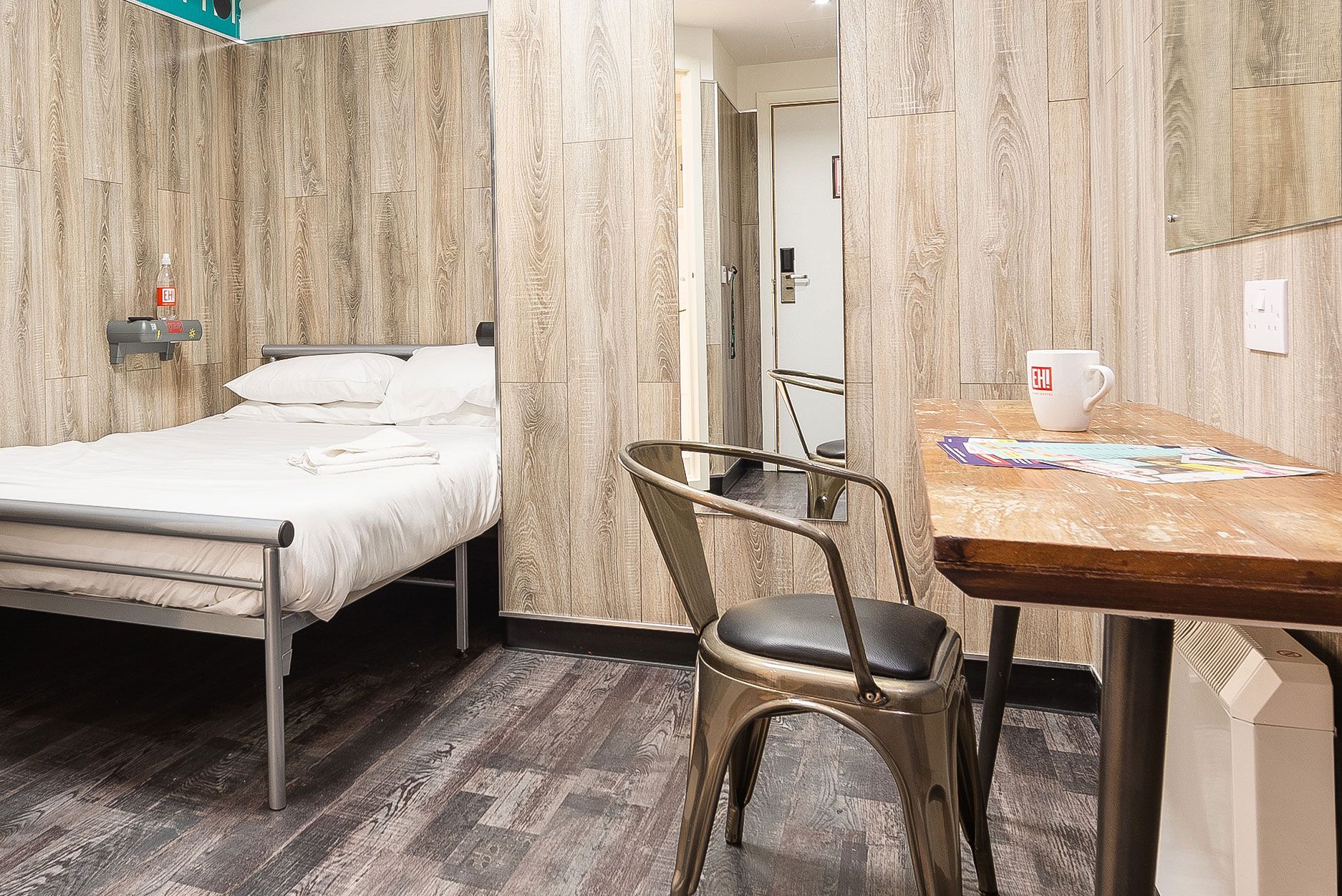 Crable over bed in hotel room